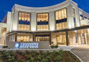 Affinity Specialty Building at Broadmoor exterior light up at night